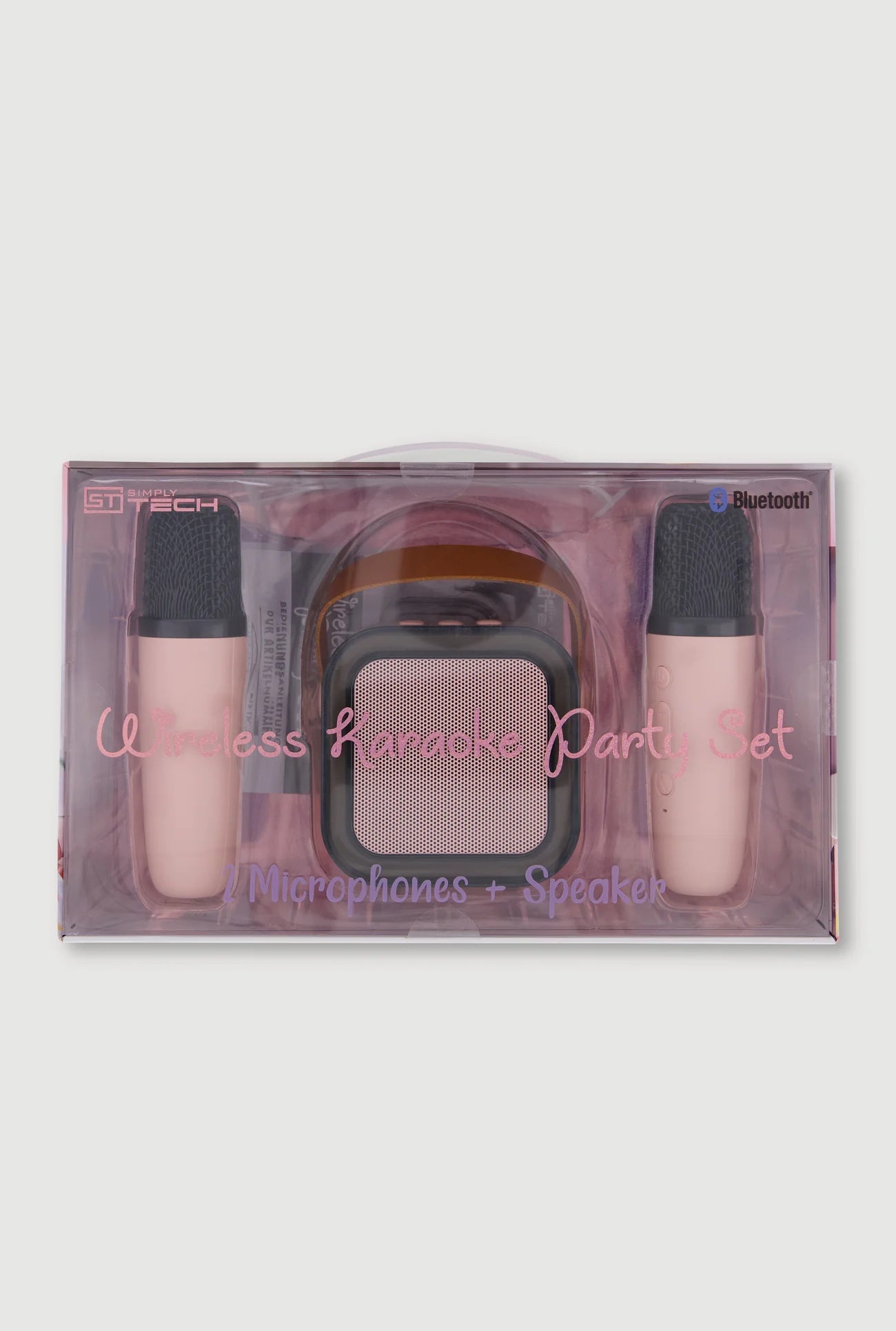 A wireless karaoke party set in a clear plastic clamshell package, containing two pink microphones with black foam covers and a pink speaker in the center.